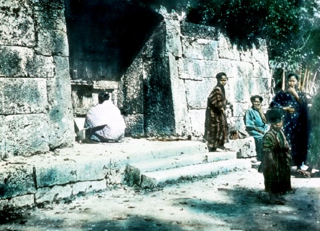 Women worshiping at shrine